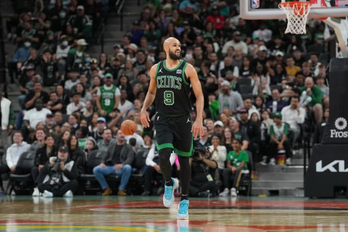 Dec 31, 2023; San Antonio, Texas, USA; Boston Celtics guard Derrick White (9) smiles in the second half against the San Antonio Spurs at Frost Bank Center.